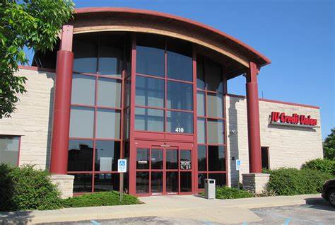 Image of the front of a IU Credit Union building.