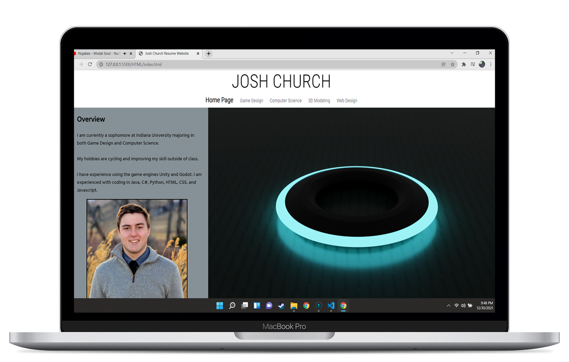 Impact image showing the home page of my website on a MacBook Pro